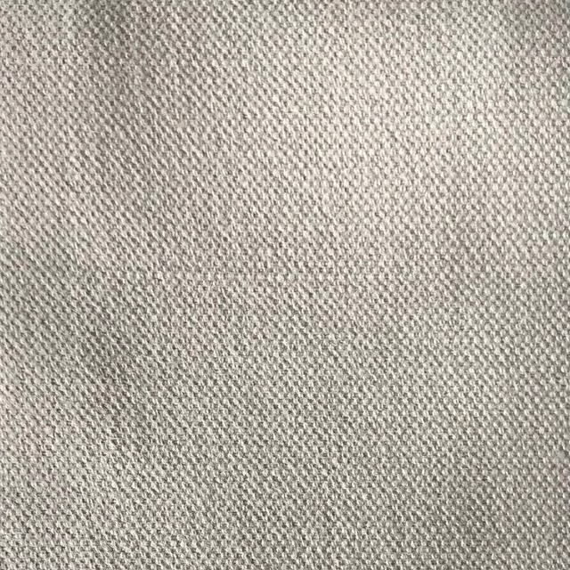 Warm greige fabric with a fine, tightly woven, subtly pebbled surface