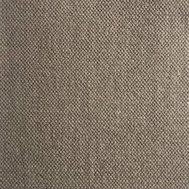 Close-up of Duo 211’s taupe-grey woven texture with fine charcoal flecks