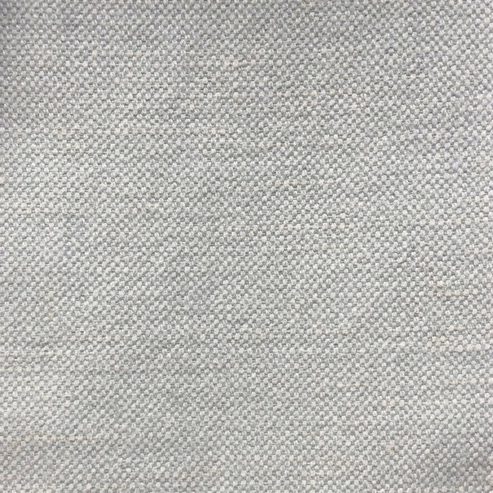 Close-up of pale dove-grey micro-weave with softly mottled light and dark threads
