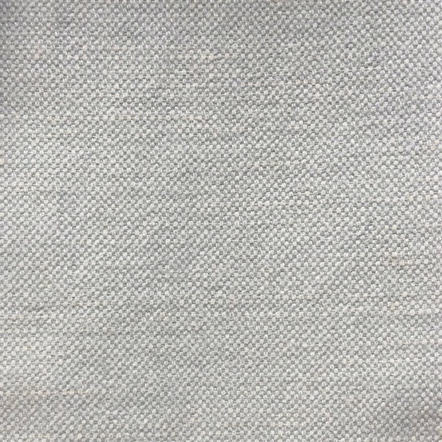 Close-up of pale dove-grey micro-weave with softly mottled light and dark threads