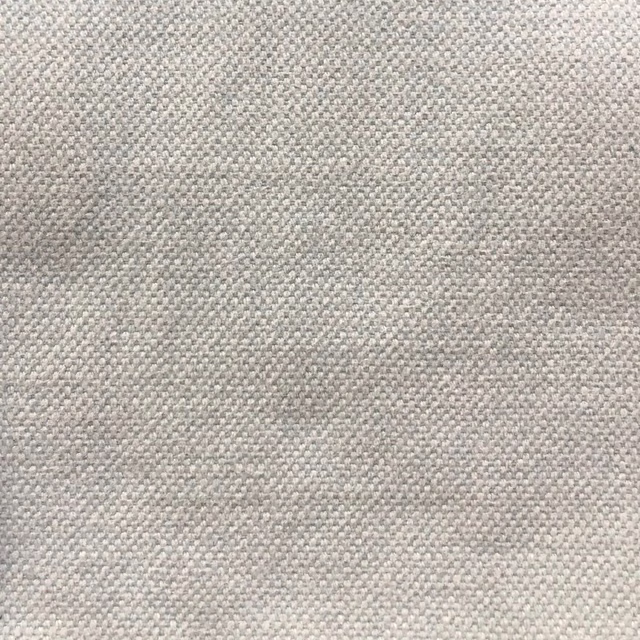 Pale greige woven textile with fine charcoal flecks and a softly tactile surface