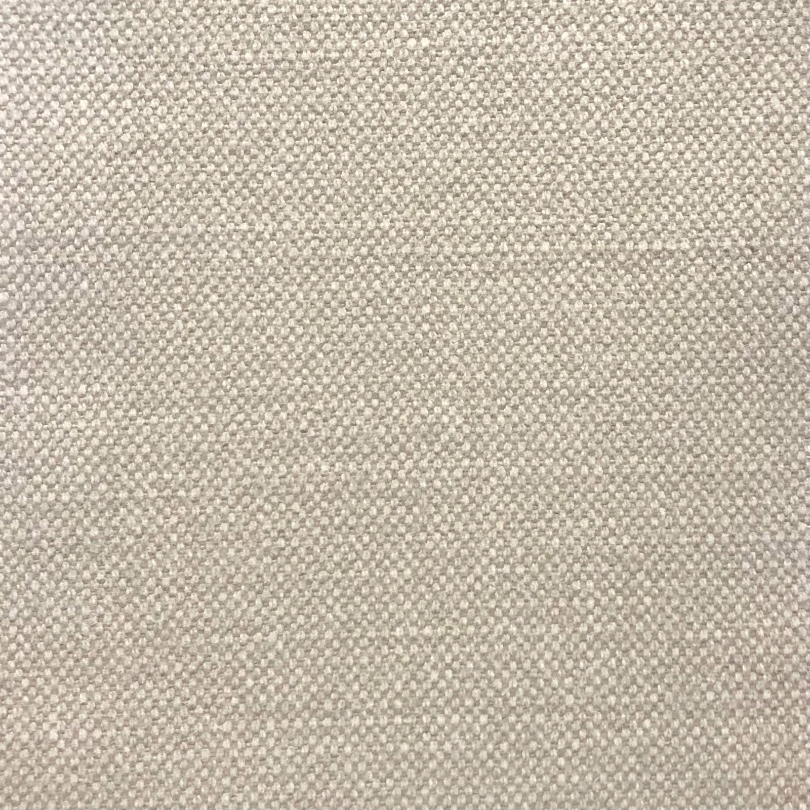 Close-up of warm greige Duo fabric with a fine irregular woven texture