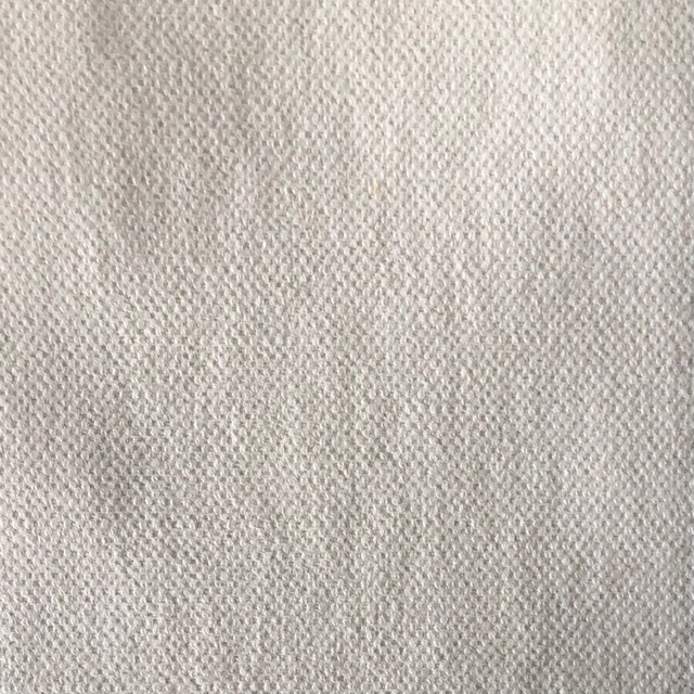 Close-up of pale greige Duo 227 showing a fine interlocking weave.