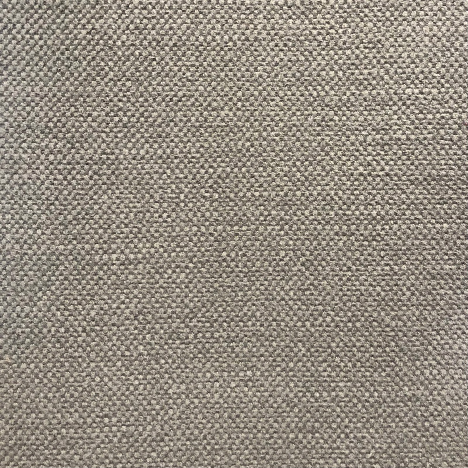 Close-up of warm taupe-grey Duo 243 with a dense, pebbled weave