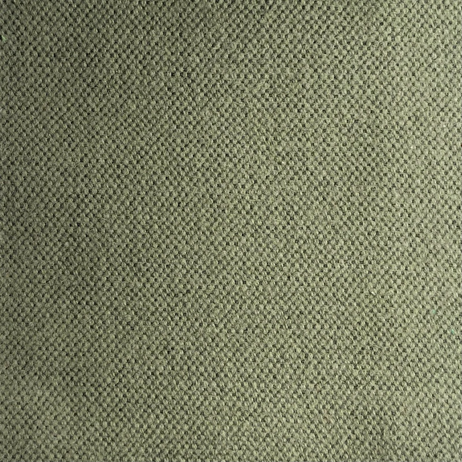 Close-up of muted olive-green fabric with a fine, softly mottled woven texture