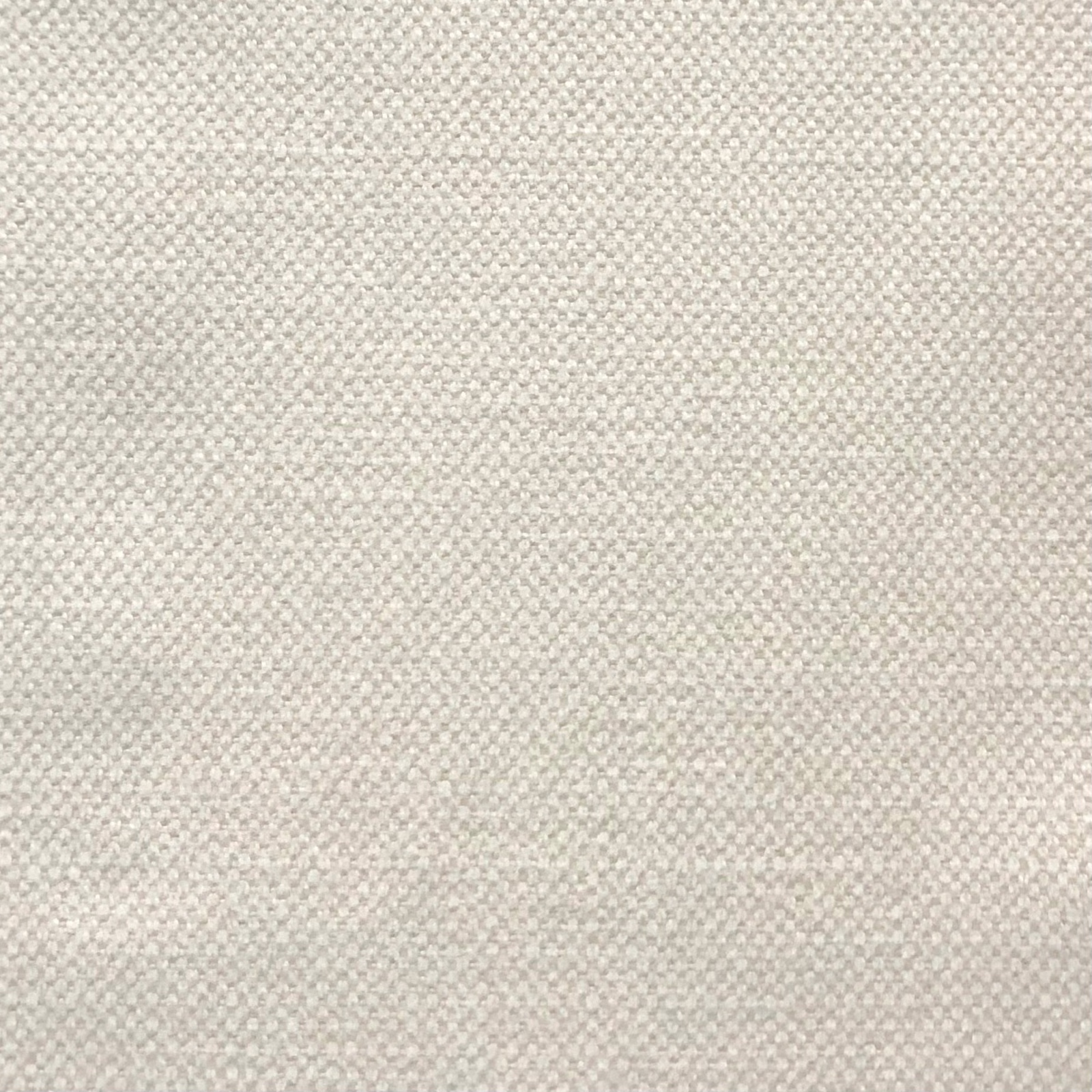 Pale greige woven textile with tiny cream and grey flecks in close-up