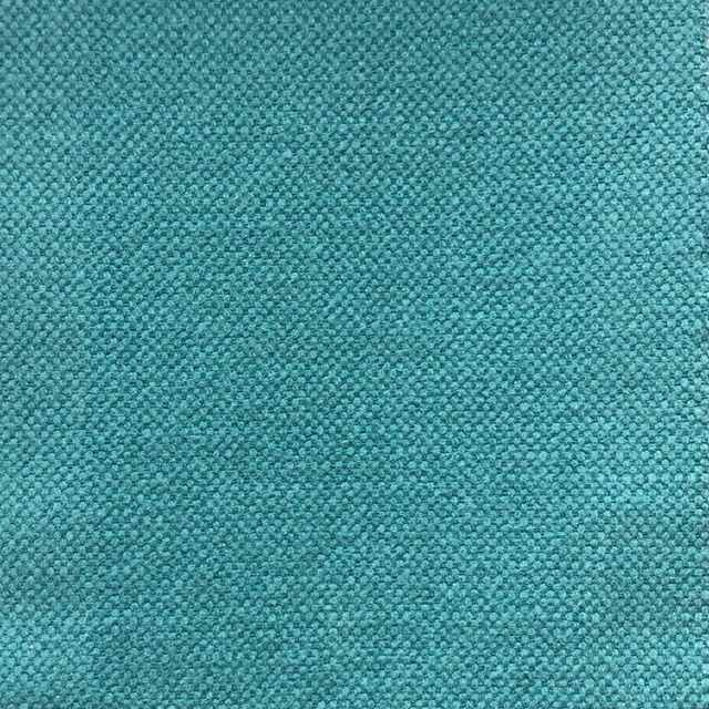 Close-up of Duo 274’s cool turquoise teal fabric with a fine pebbled weave