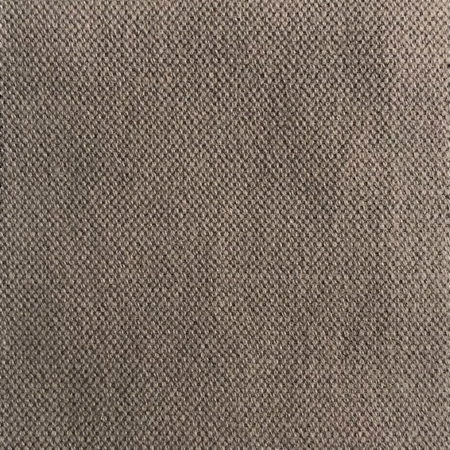 Close-up of mottled taupe-brown weave with dark flecks and nubby texture