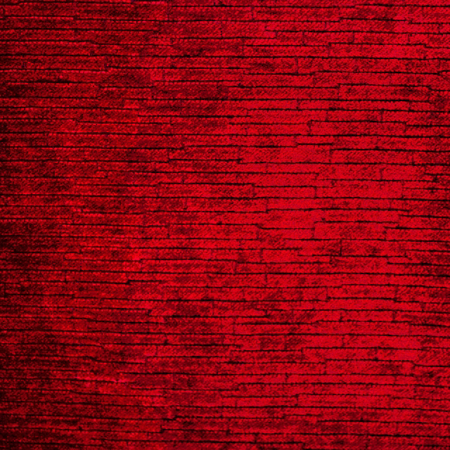 Deep garnet red chenille swatch with irregular horizontal ridges and soft lustrous texture