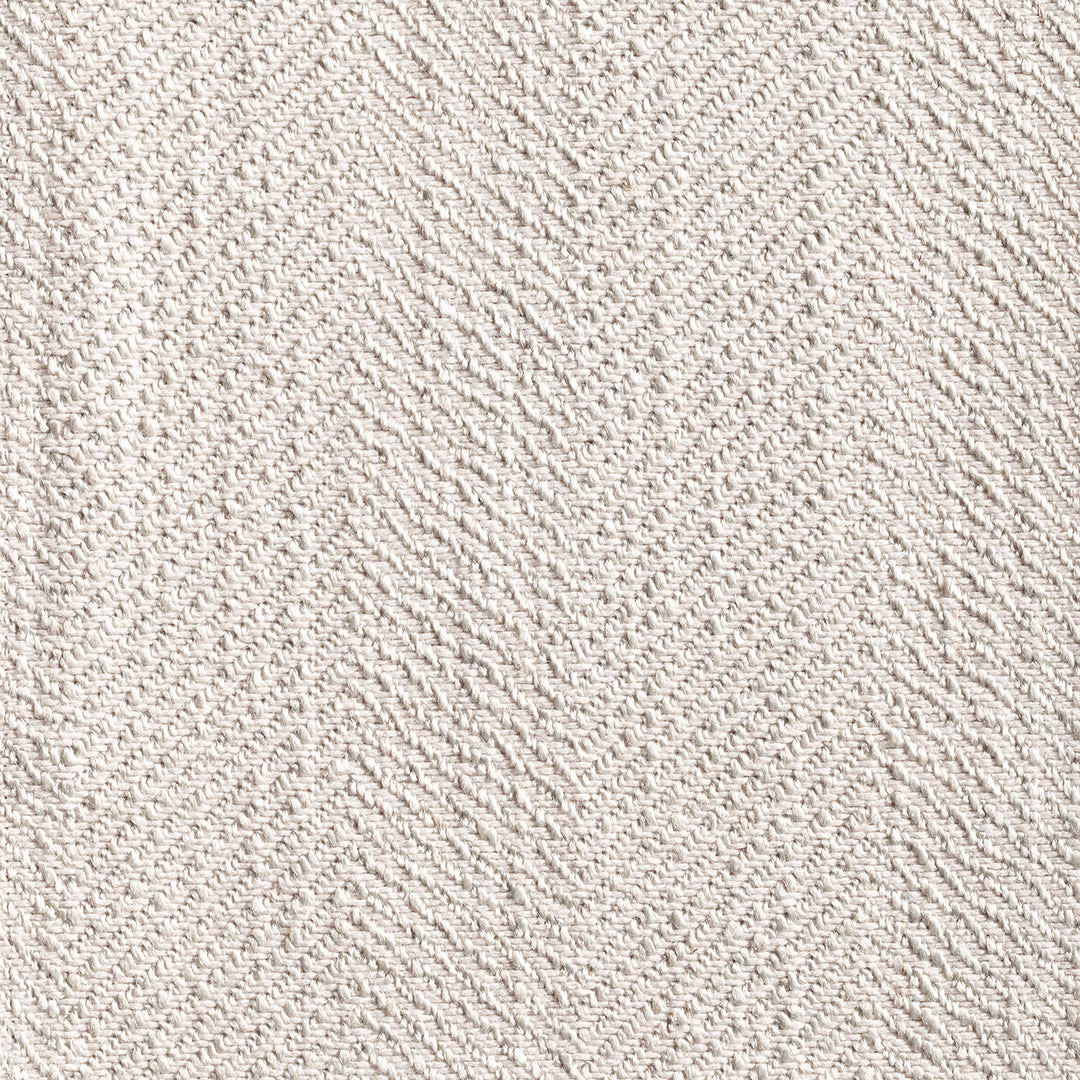 Close view of elephant grey woven fabric with a fine, flecked chevron texture