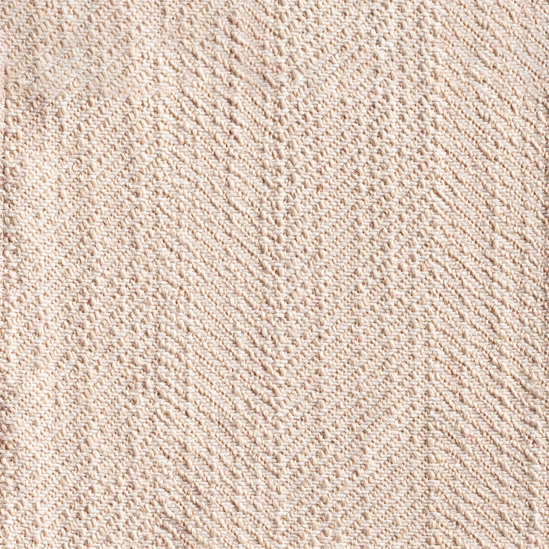 Warm ivory-beige woven fabric with tactile diagonal herringbone texture