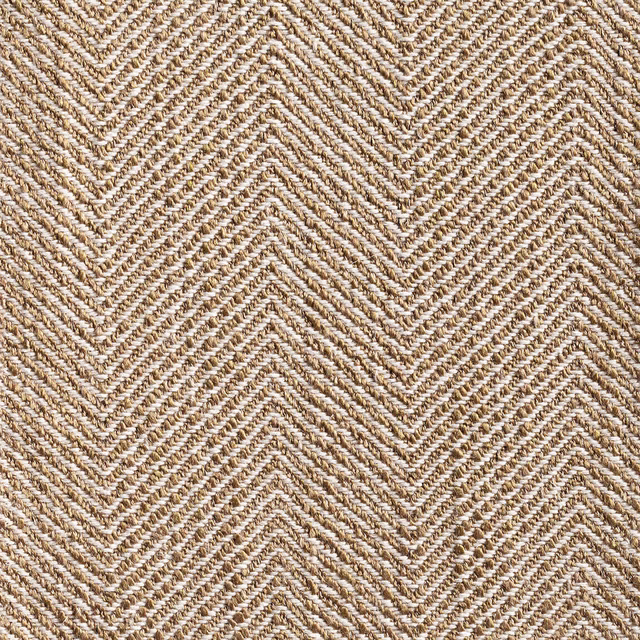 Warm ivory and tan chevron upholstery fabric with a chunky raised woven texture