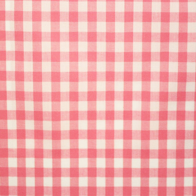 Soft coral pink and cream large-scale check with a lightly textured weave