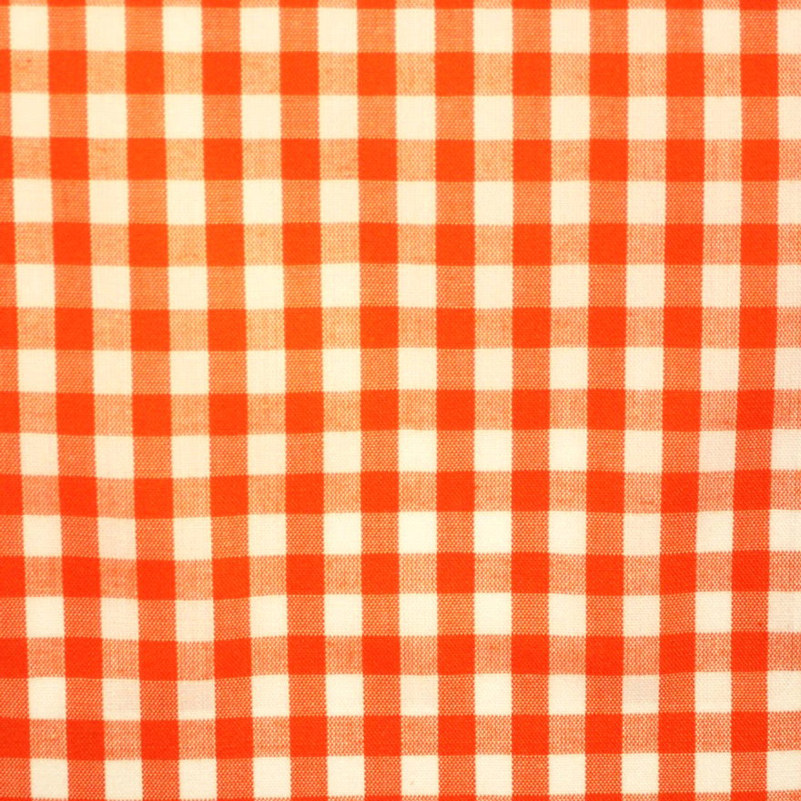 Warm orange-red and cream woven gingham check with subtle textile texture