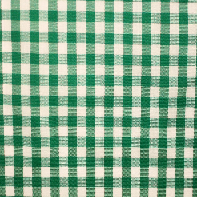 Emerald green and cream medium-scale check with a softly textured woven surface