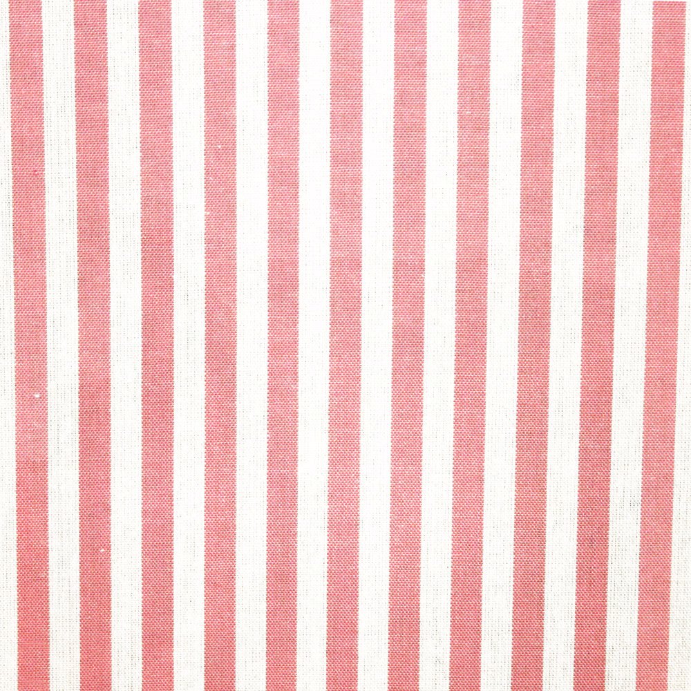 Muted coral pink and ivory vertical stripe fabric with a fine woven texture