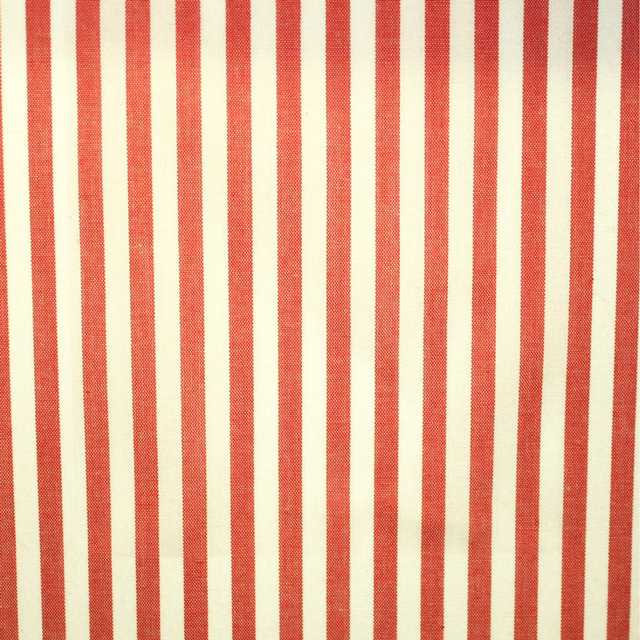 Warm coral-red and cream vertical striped woven fabric with a fine tactile grain