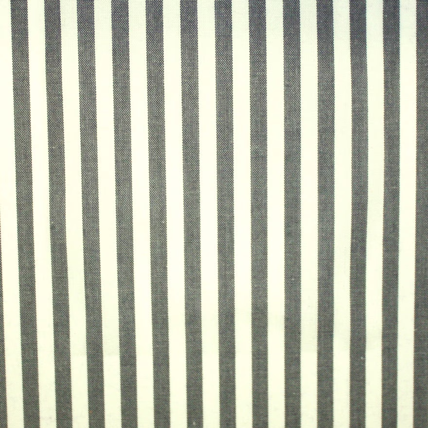 Close-up of fine woven fabric with charcoal and ivory vertical stripes