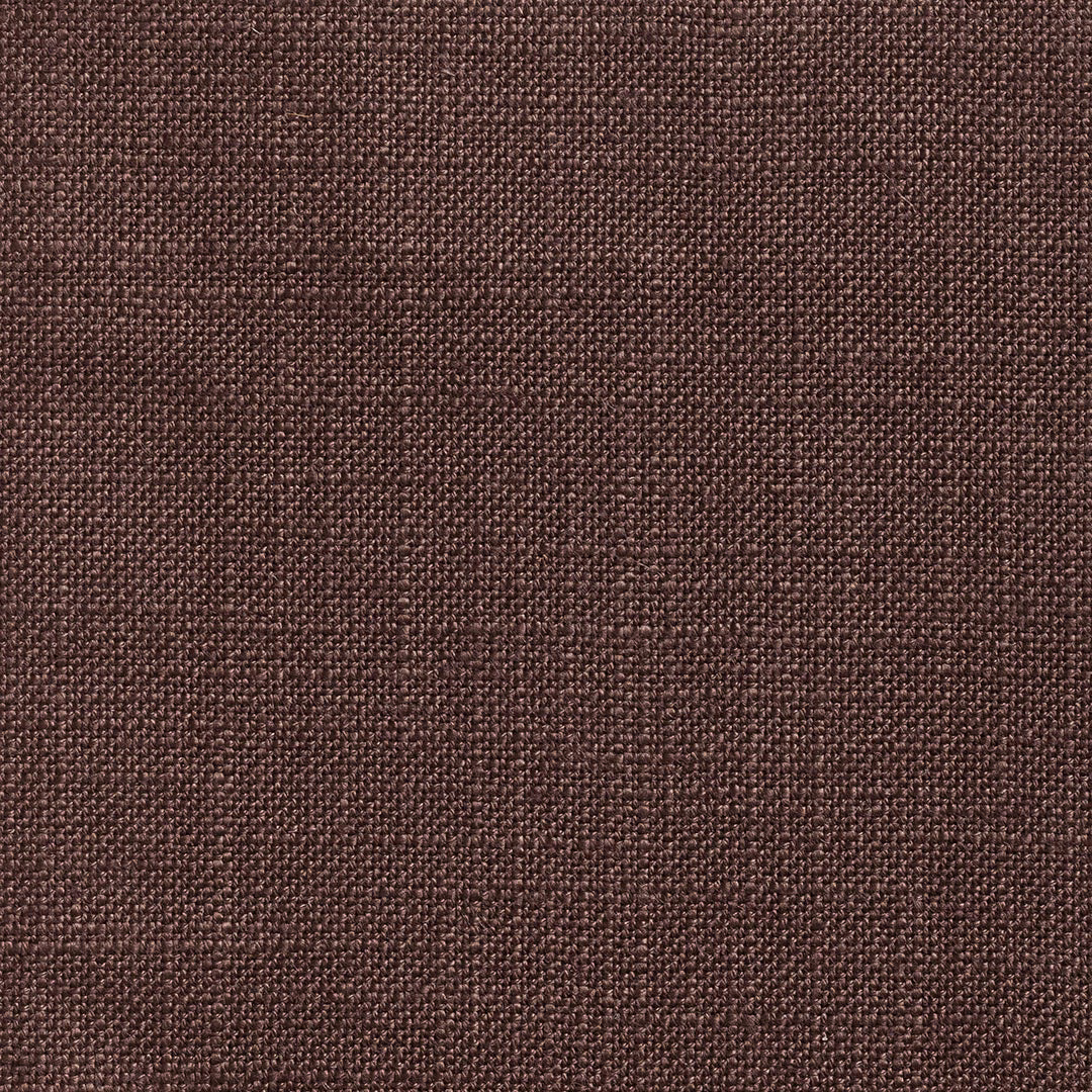 Close-up of warm cocoa-brown fabric with a fine, irregular woven texture