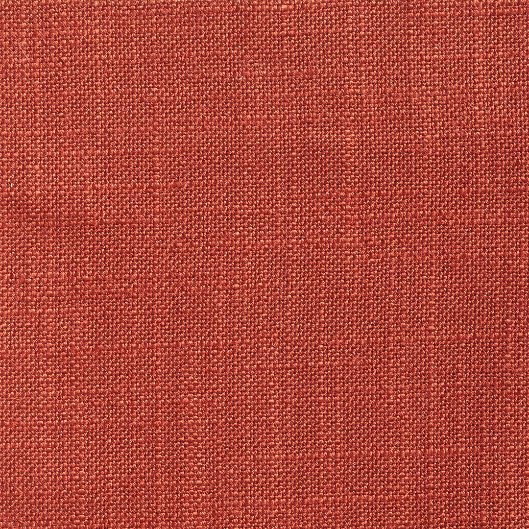 Close-up of warm henna-red Ikema fabric with finely textured woven surface