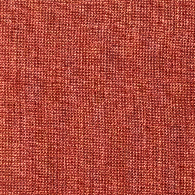 Close-up of warm henna-red Ikema fabric with finely textured woven surface