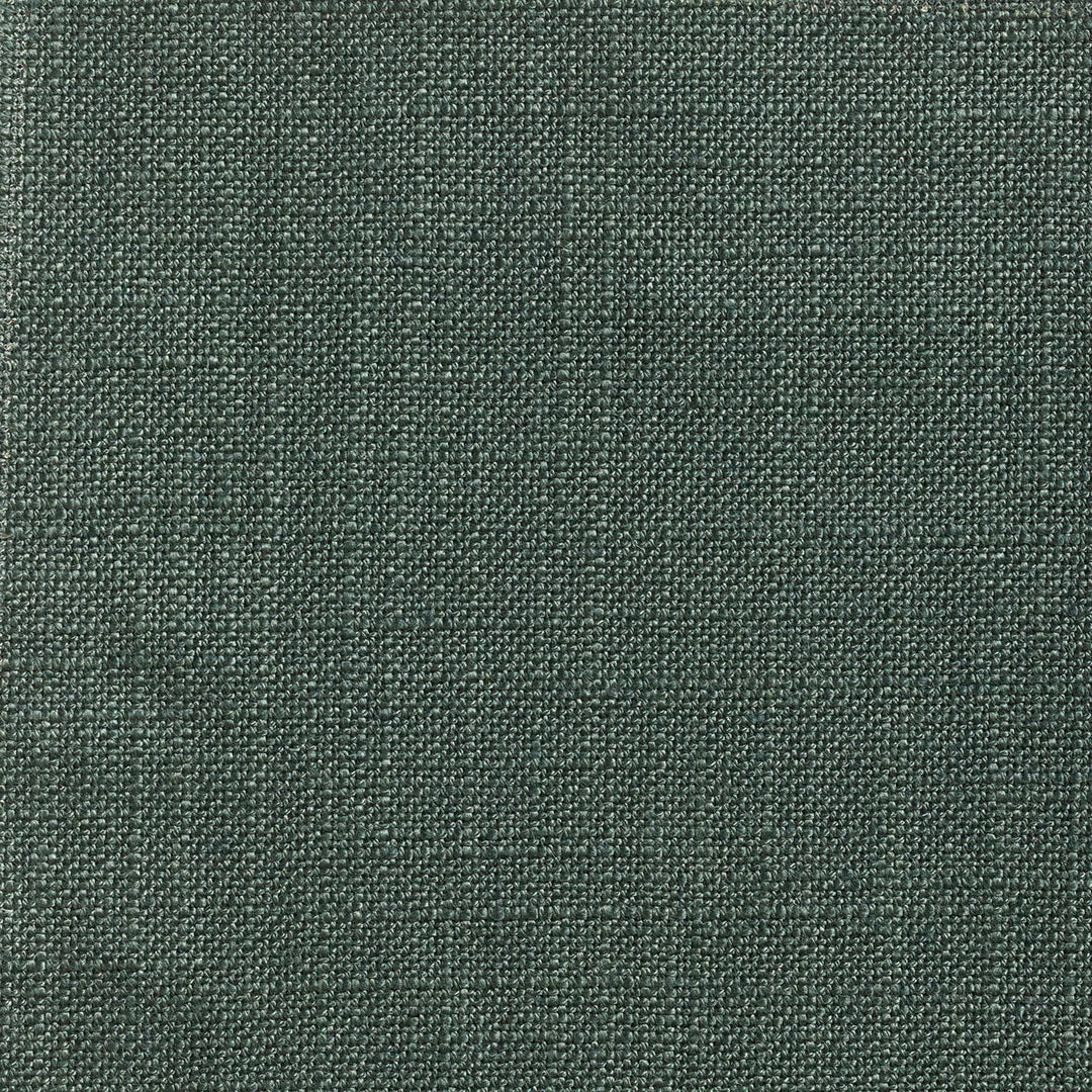 Close-up of deep spruce-green woven fabric with a fine nubby texture
