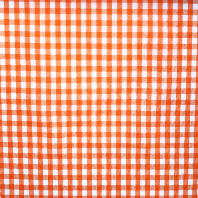 Small terracotta orange and white gingham check with a fine woven surface