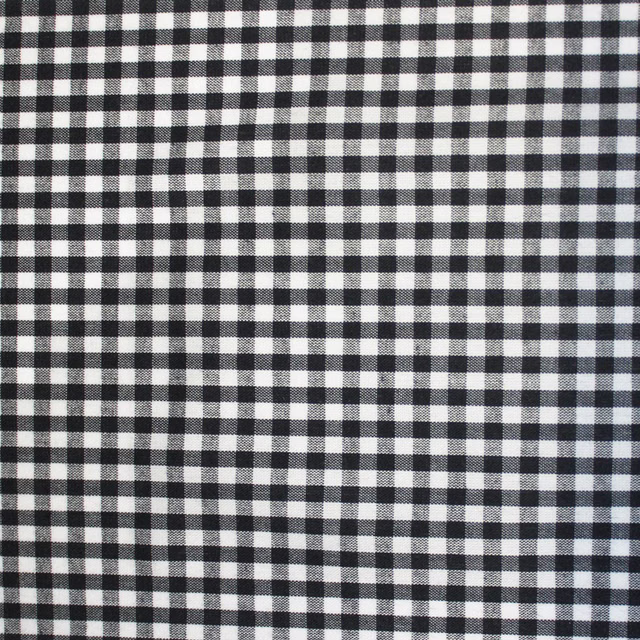 Small black-and-white woven check with softly textured yarn definition