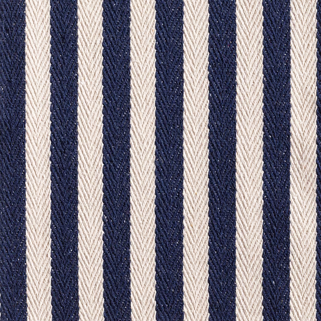 Close-up of navy and cream vertical stripes with a pronounced woven texture