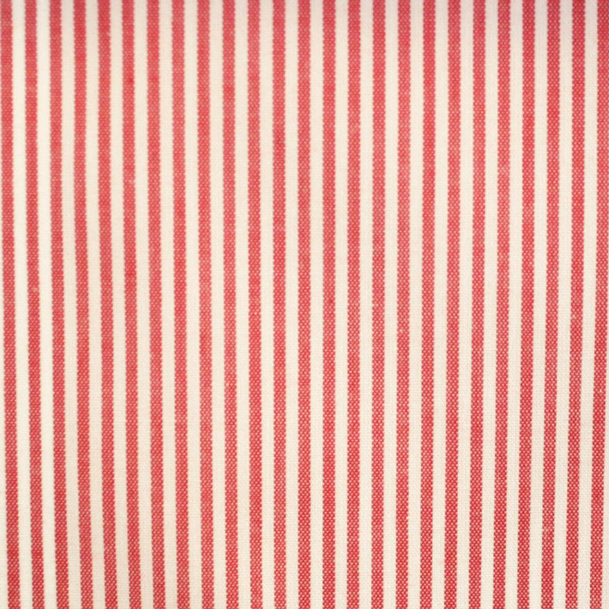 Warm coral-red and cream fine vertical stripe fabric with a subtle woven texture