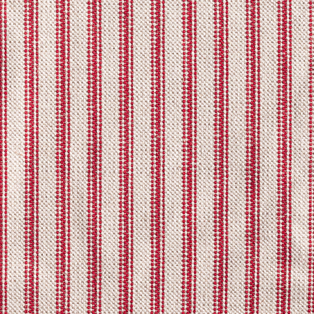 Warm red and ivory woven ticking with narrow vertical stripes and slubby texture