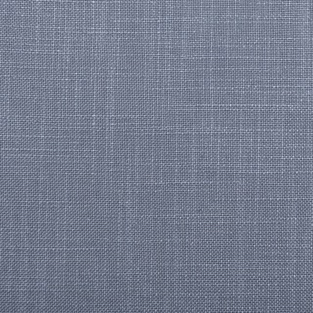 Close-up of muted cornflower blue-grey fabric with a fine crosshatched weave