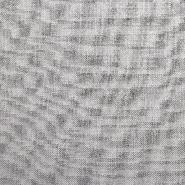 Close-up of warm light-grey plain weave with fine crosshatch texture