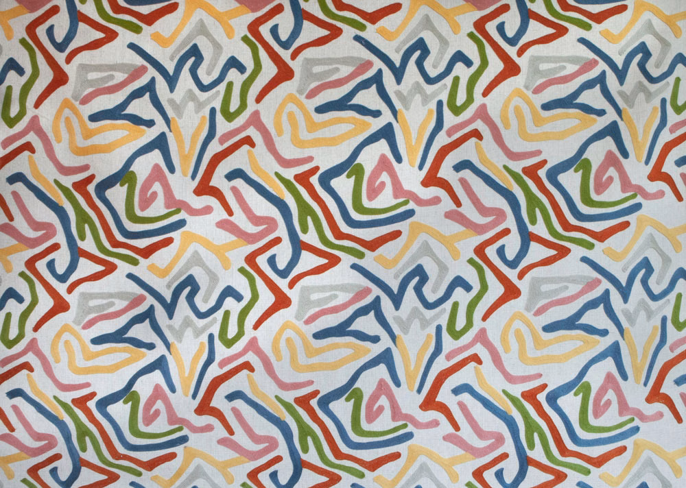 Abstract multicolour embroidery-style fabric on an ivory ground