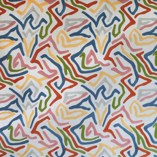 Abstract multicolour embroidery-style fabric on an ivory ground