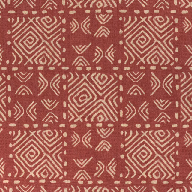 Terracotta geometric fabric swatch with cream block pattern