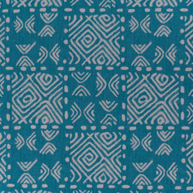 Teal geometric fabric swatch with pale diamond and chevron repeat