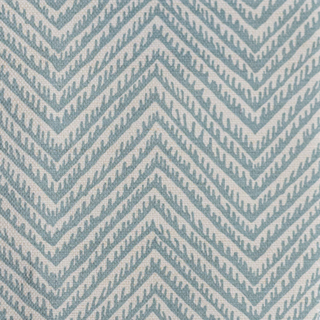 Soft aqua blue and ivory chevron herringbone weave with textured resist effect