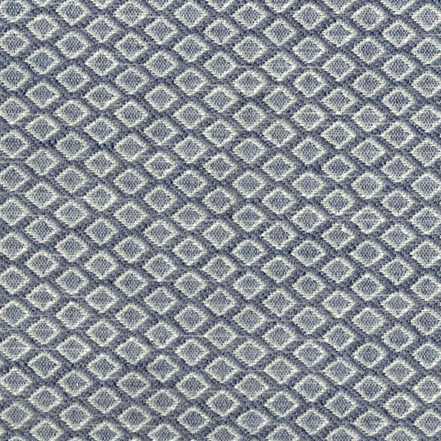 Close-up of a blue diamond-weave geometric fabric with pale highlights