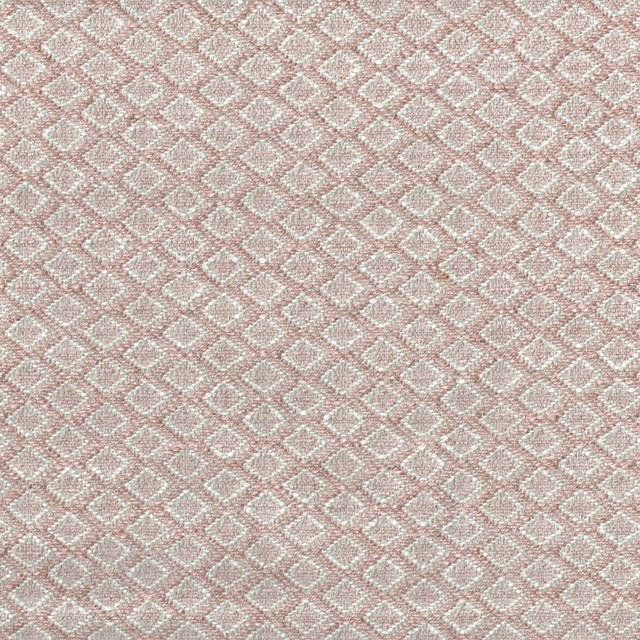 Pale shell pink woven fabric with small ivory diamond lattice pattern