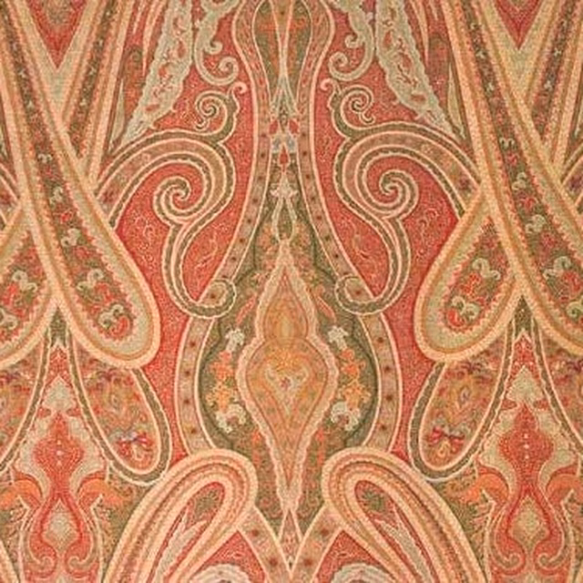 Large coral-red damask fabric with cream scrolls and olive-gold accents