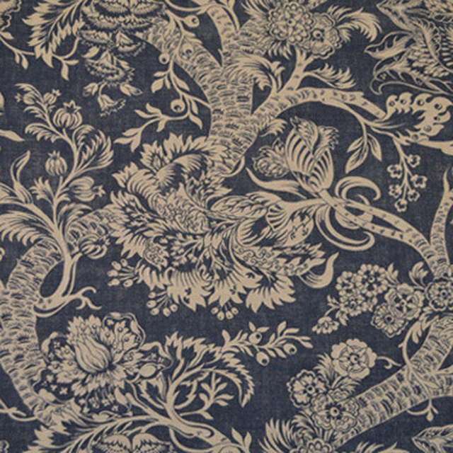 Large cream tree-of-life botanical motif on a deep indigo ground
