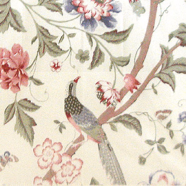 Cream floral fabric with sage leaves, pink blooms and a small bird motif