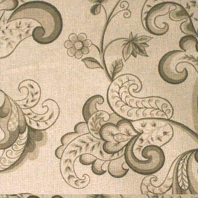 Beige woven fabric with large sage floral scrolls and paisley motifs