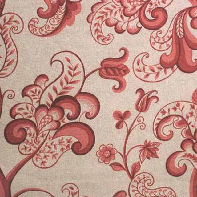 Beige fabric swatch with large rose-pink scrolling floral pattern