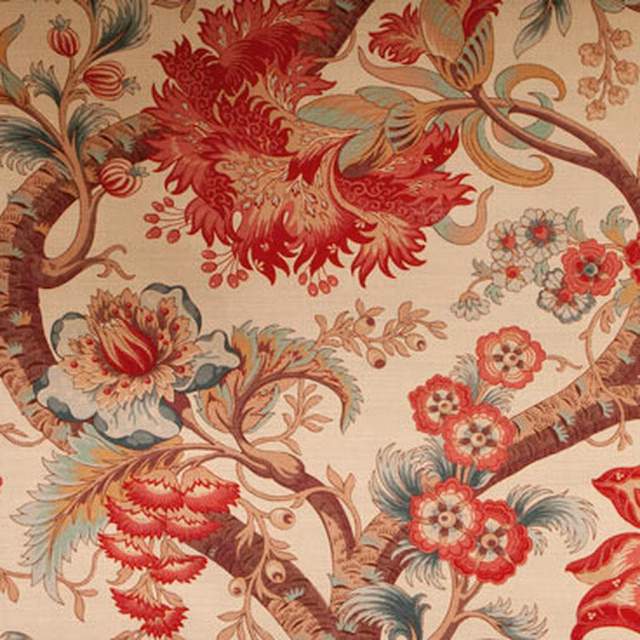 Large botanical fabric swatch in warm red, cream and blue-green floral branches