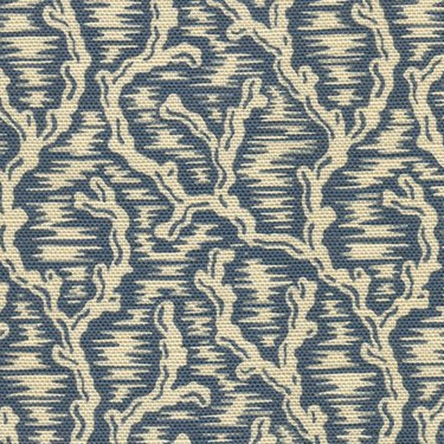 Slate blue patterned fabric with pale cream woven motif and textured ground