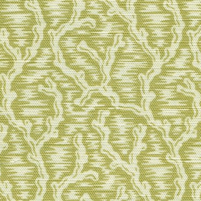 Chartreuse woven fabric with scrolling damask pattern and pale highlights