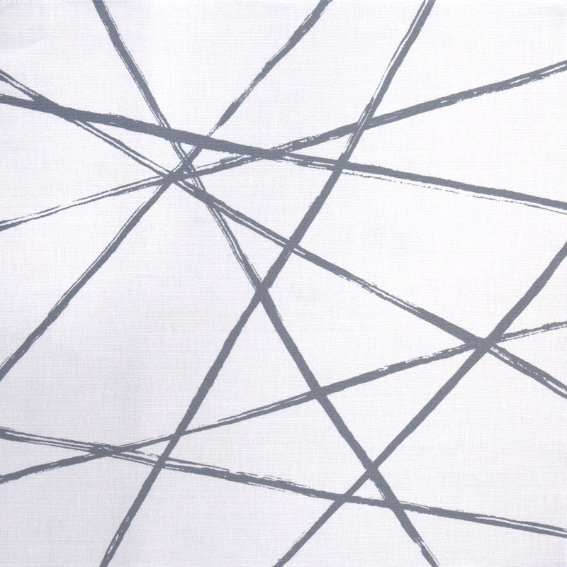Abstract grey intersecting lines on a pale woven fabric background
