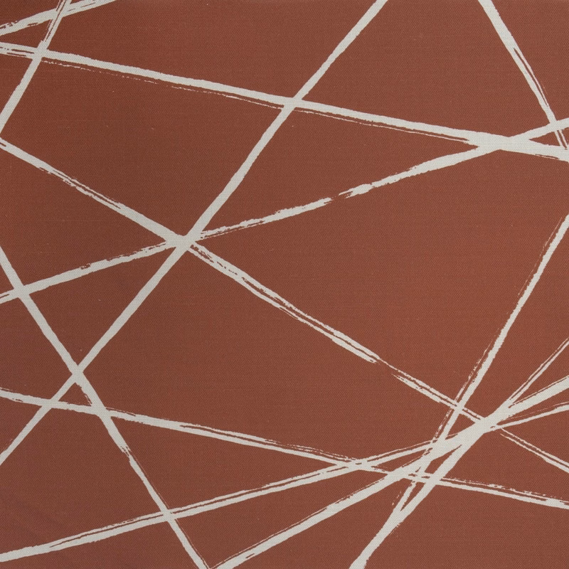 Terracotta red fabric with intersecting ivory linear brushstroke pattern